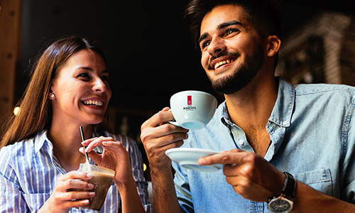 Couple drinking Robert Roberts Coffee